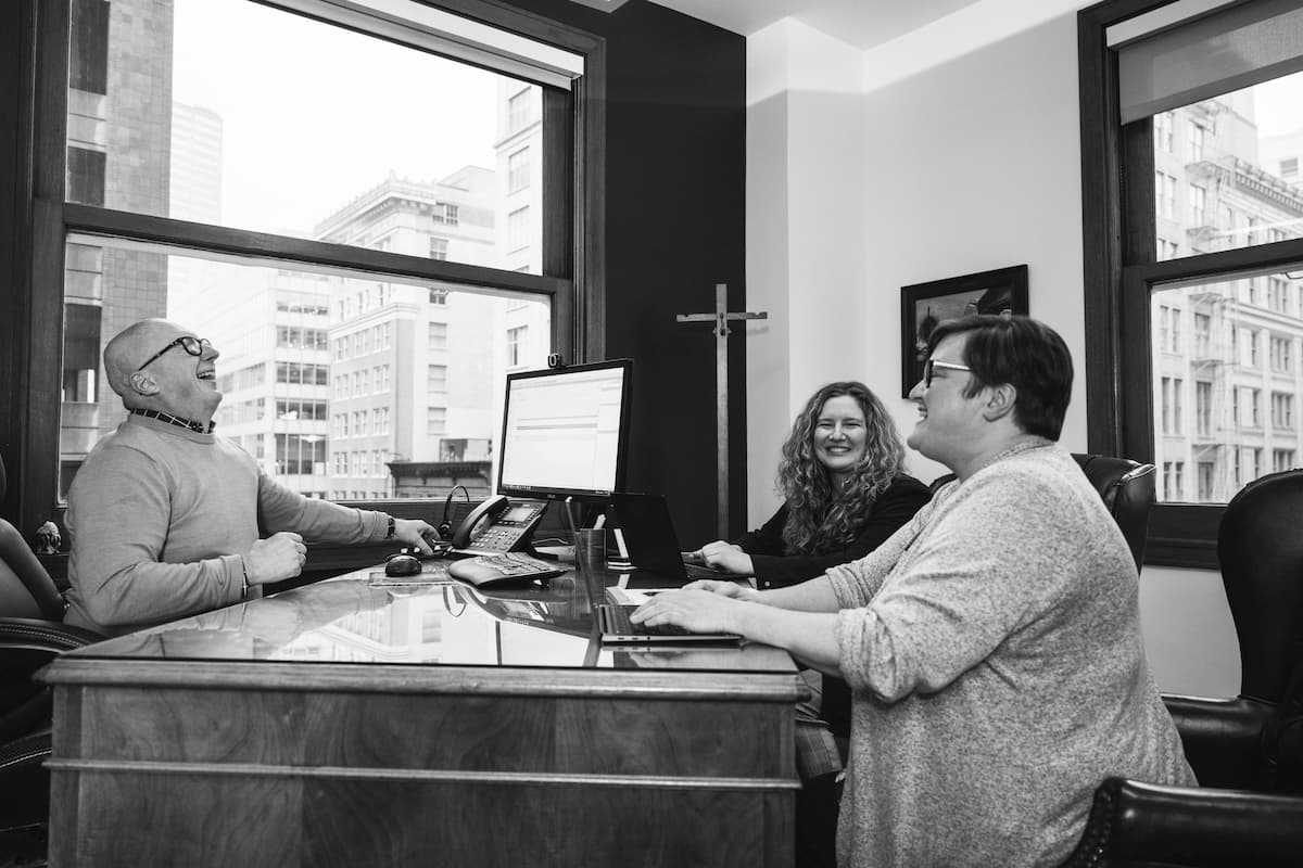 Jim, Savannah, and Steph at Bridge City Law Office of attorney Jim Dwyer